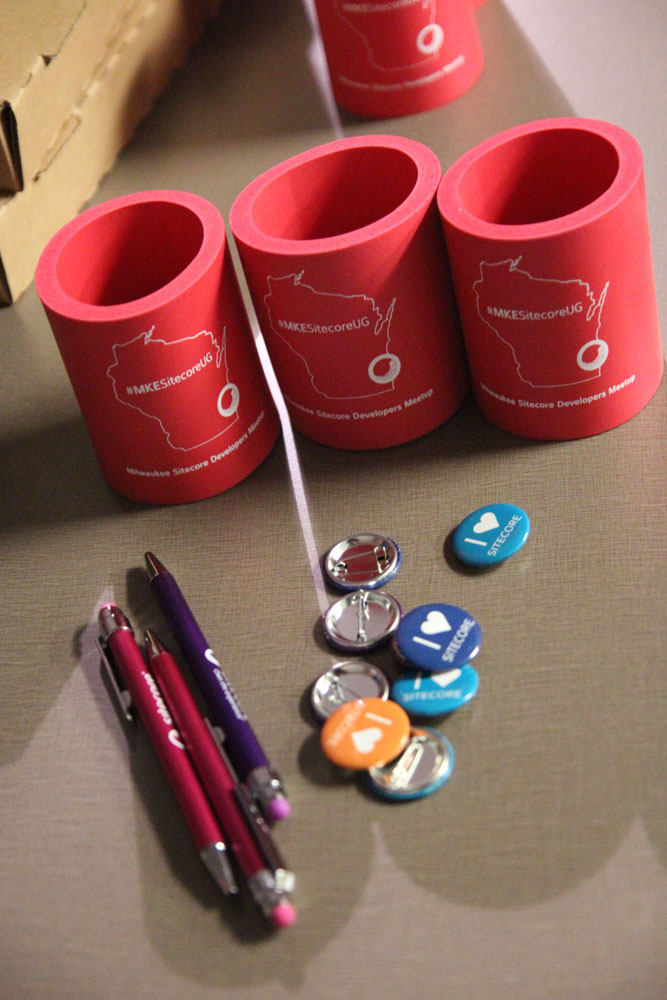 Sitecore pens, buttons and can cozies